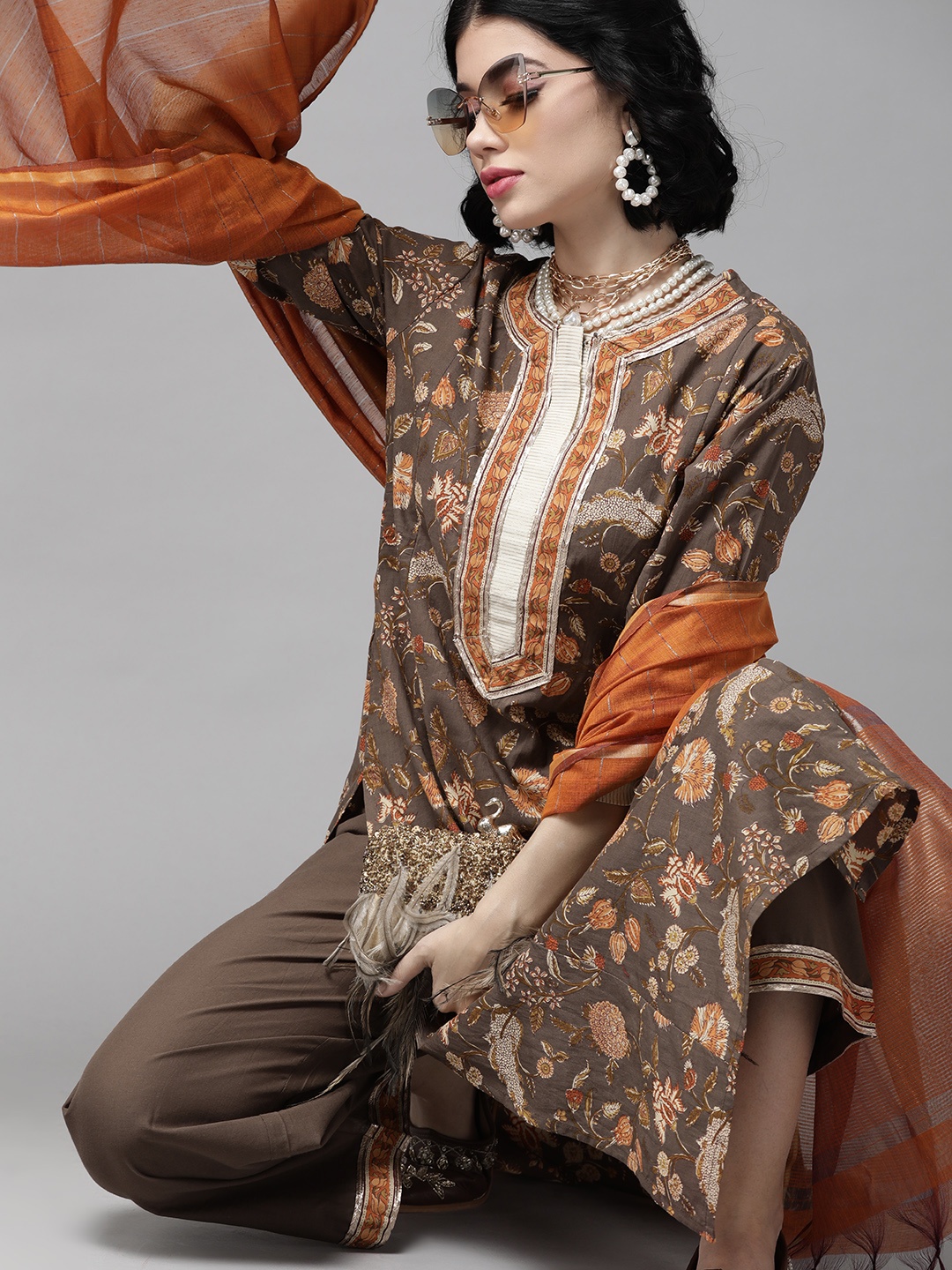 

Indo Era Taupe & Orange Floral Screen Print Kurta with Palazzos and Dupatta