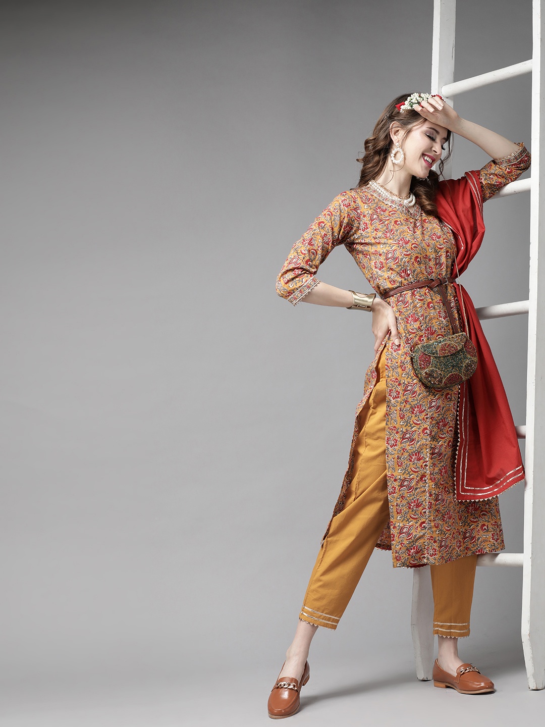 

Indo Era Women Mustard Yellow & Red Printed Kurta with Palazzos & Dupatta