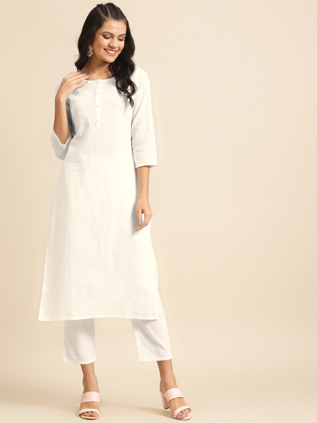 

Prakrti Women Off-White Solid Kurta with Trousers