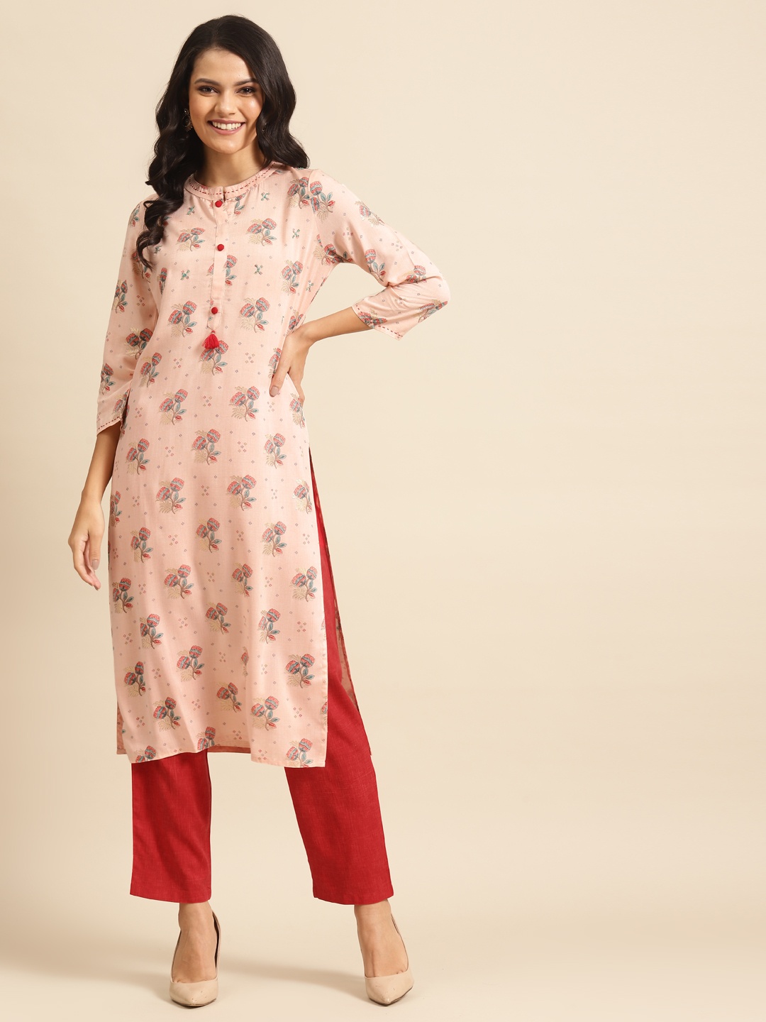 

Prakrti Women Peach-Coloured & Red Foil Printed Kurta with Trousers