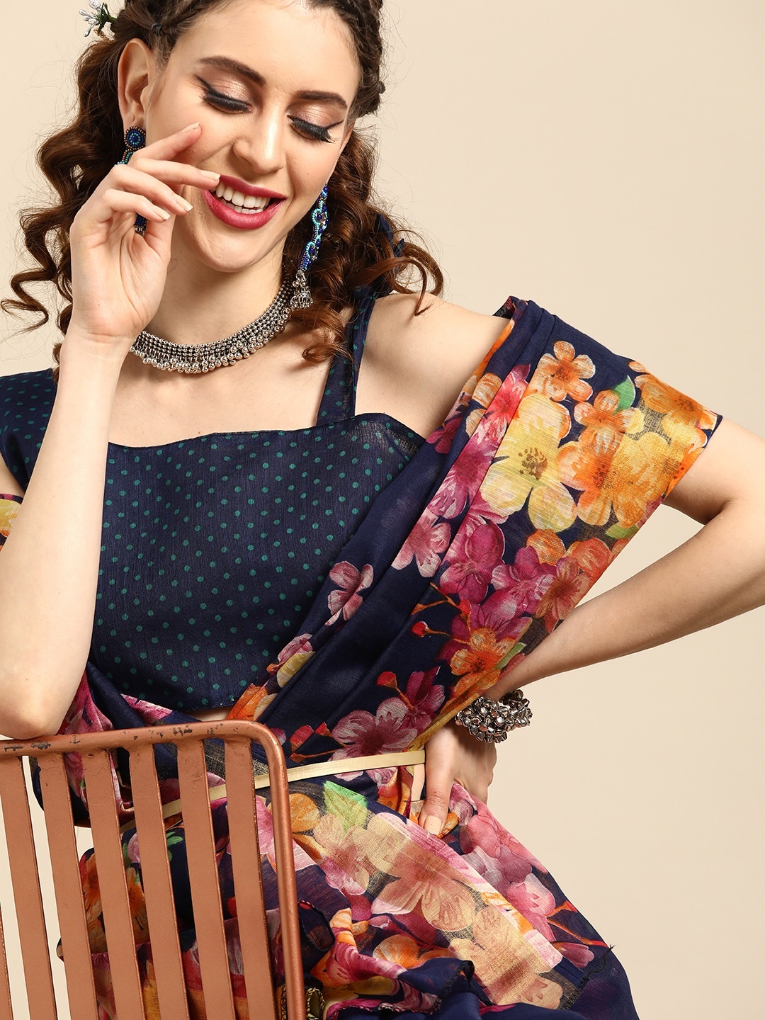 

Saree mall Navy Blue & Orange Floral Printed Saree