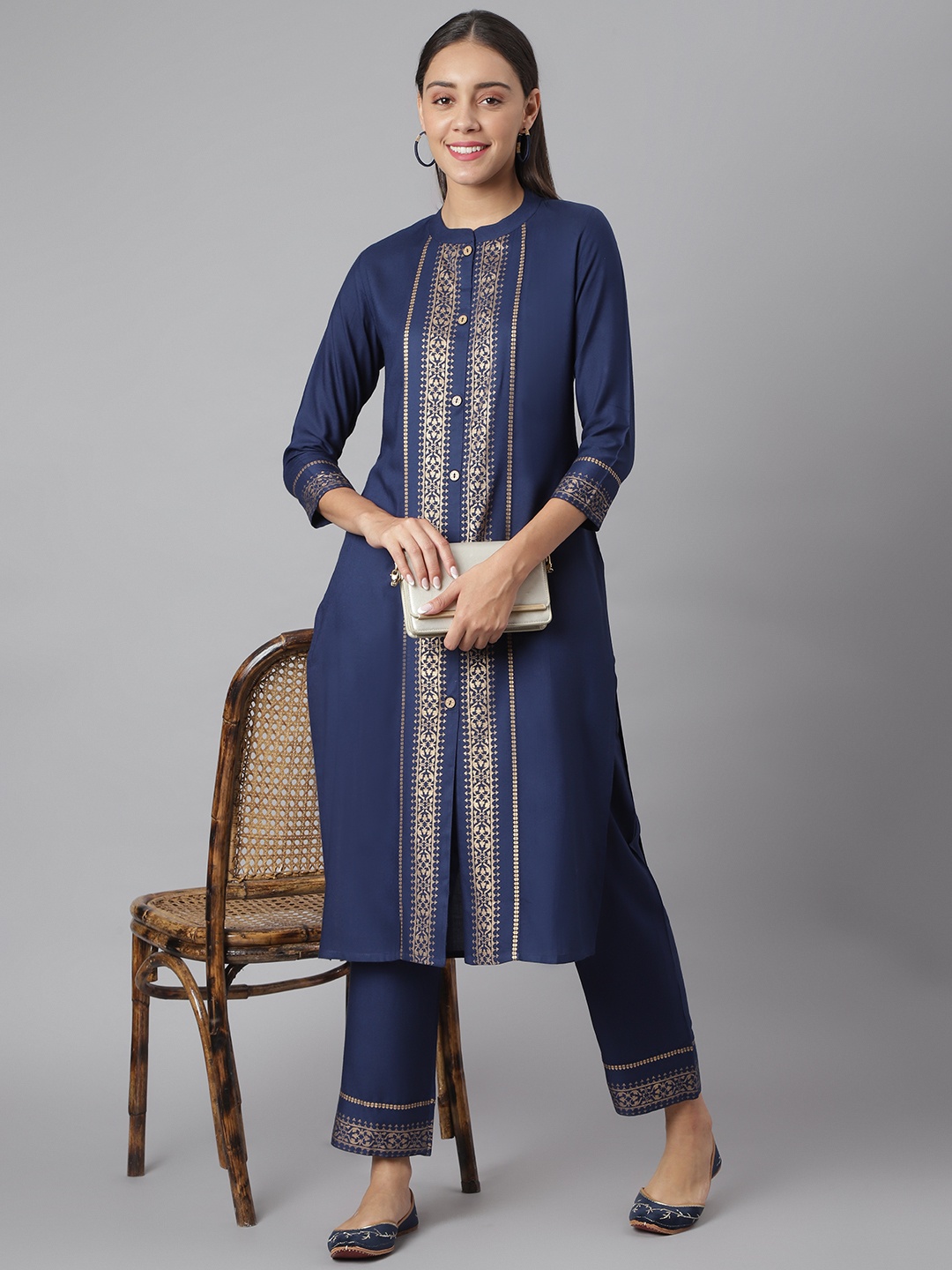 

Khushal K Women Navy Blue &Gold-Toned Striped Kurta with Trousers