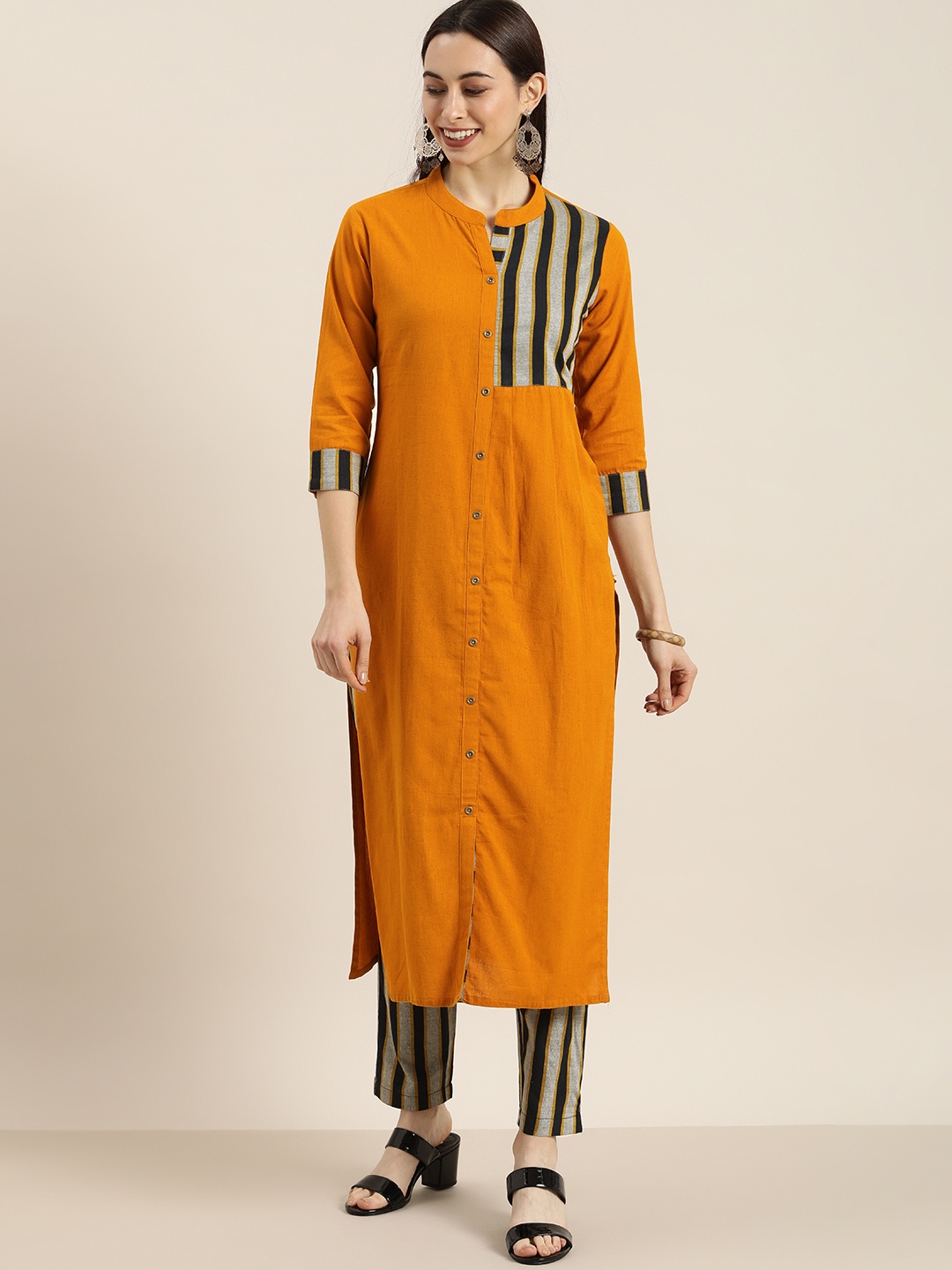 

KSUT Women Mustard & Grey Self Design Kurta with Trousers