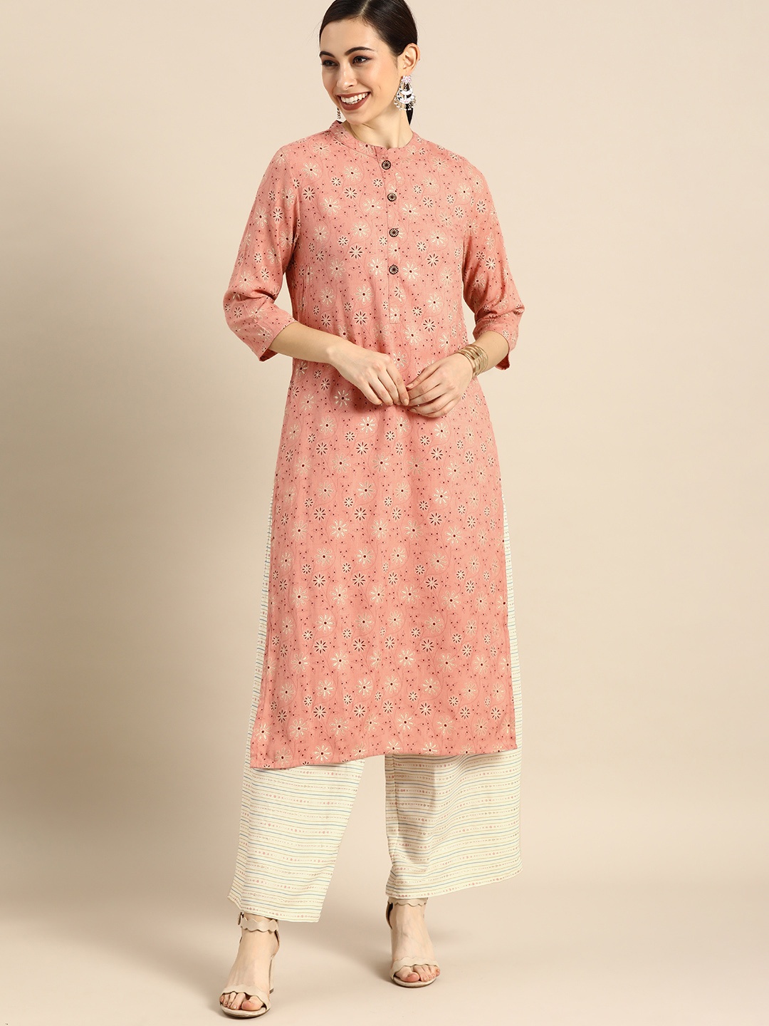 

Anouk Women Peach-Coloured & Gold-Toned Foil Printed Kurta with Palazzos