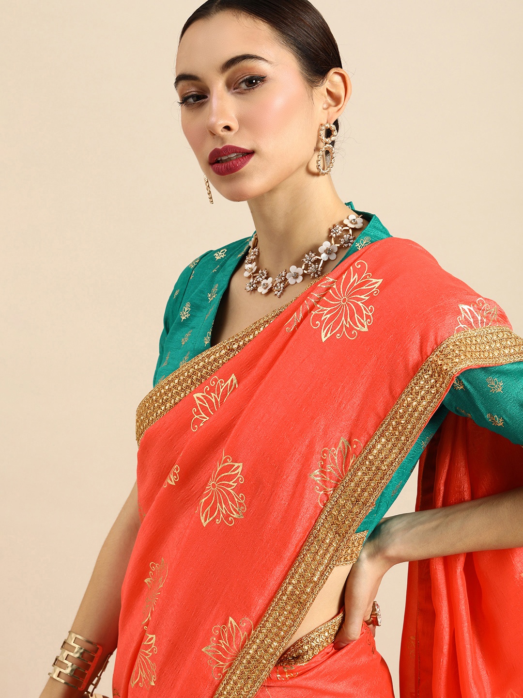 

Anouk Coral Orange & Gold-Toned Silk Blend Foil Printed Saree