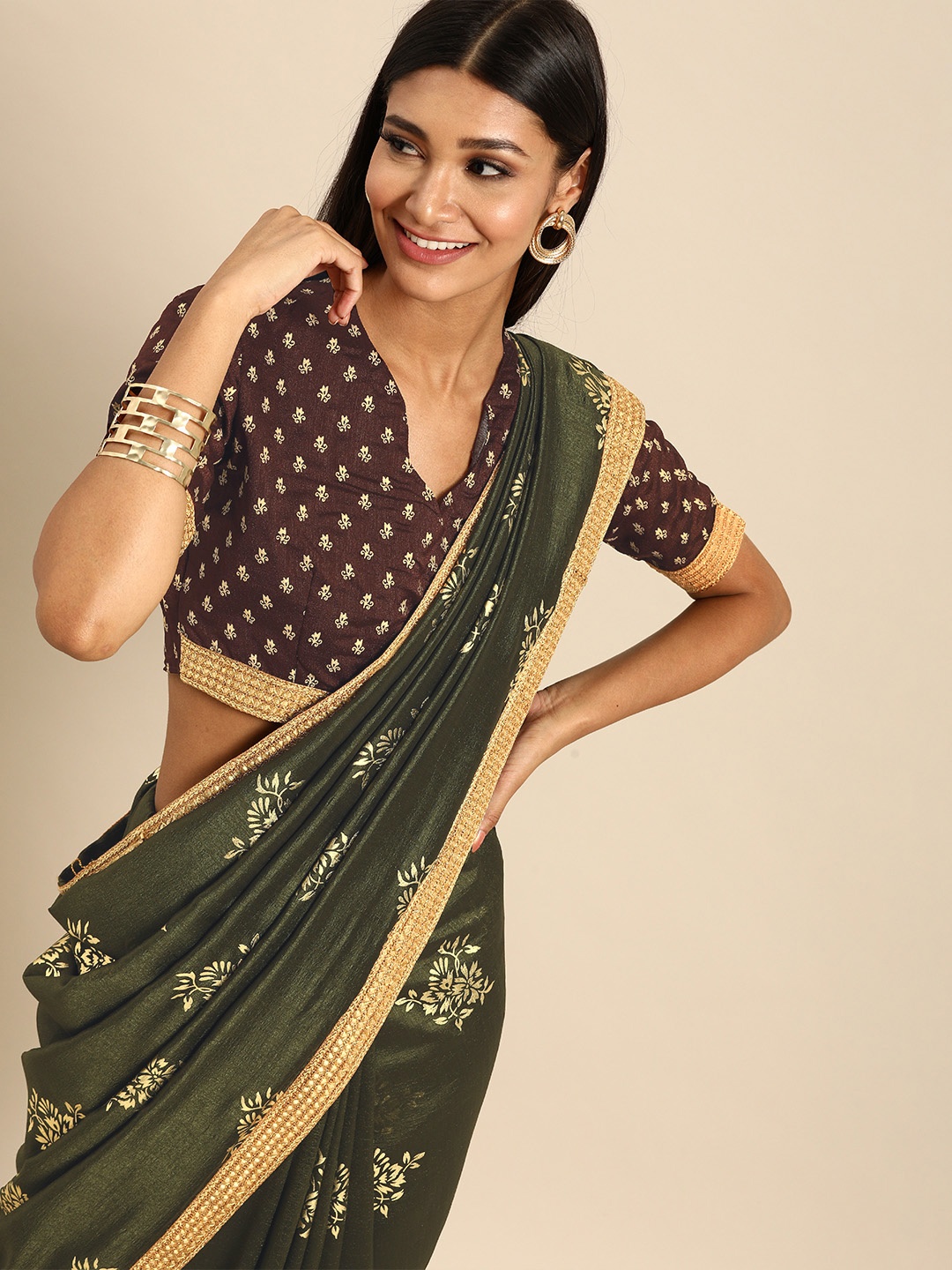 

Anouk Olive Green & Gold-Toned Silk Blend Foil Printed Saree