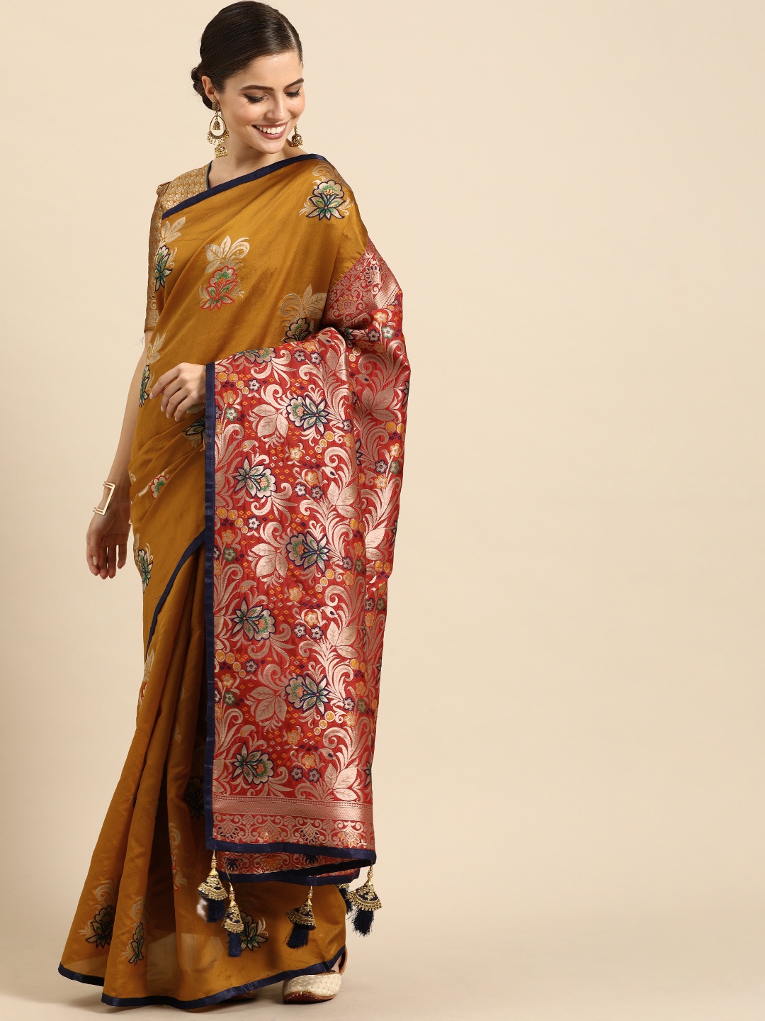 

Anouk Mustard Woven Design Silk Blend Saree
