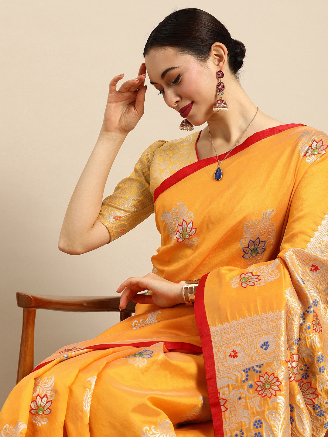 

Anouk Yellow & Red Silk Blend Woven Design Saree