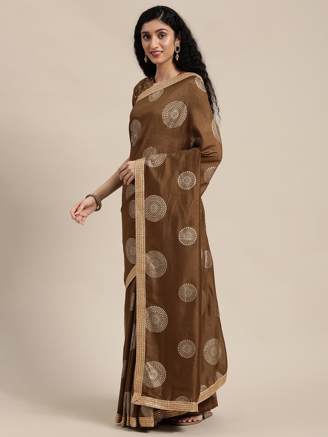 

Anouk Brown Ethnic Motifs Beads and Stones Silk Blend Saree