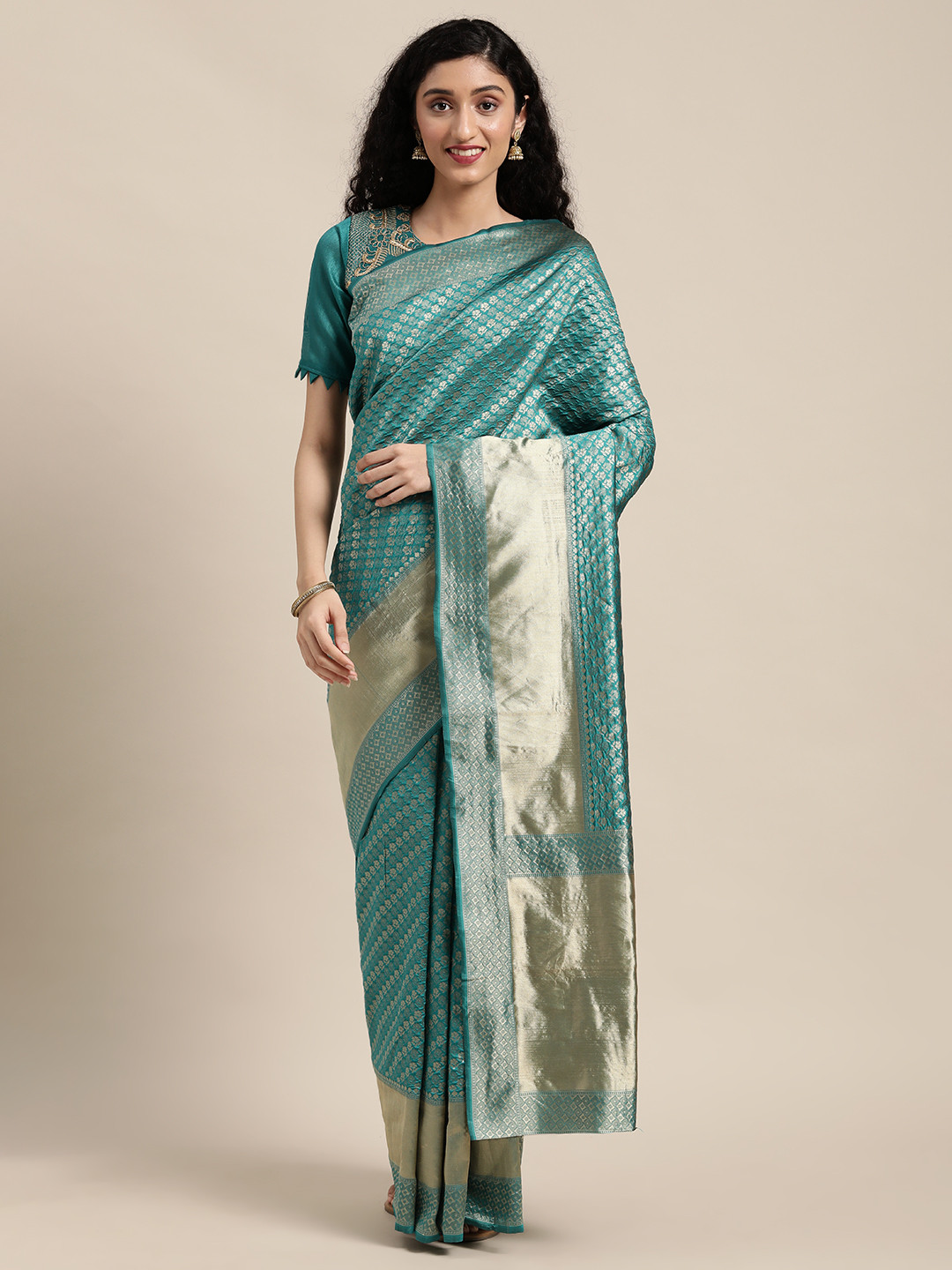 

Anouk Teal Green & Golden Zari Woven Design Silk Blend Saree
