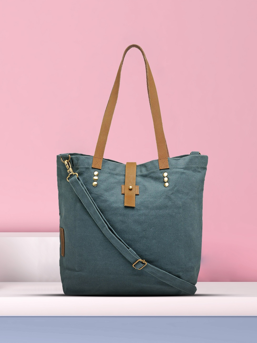 

The House of Tara Blue Solid Handheld Bag