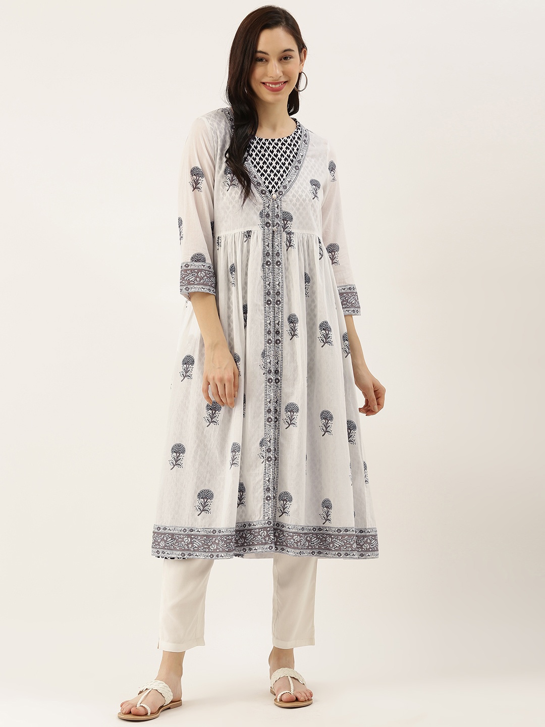 

AMUKTI Women White & Black Ethnic Motifs Printed Layered Kurta