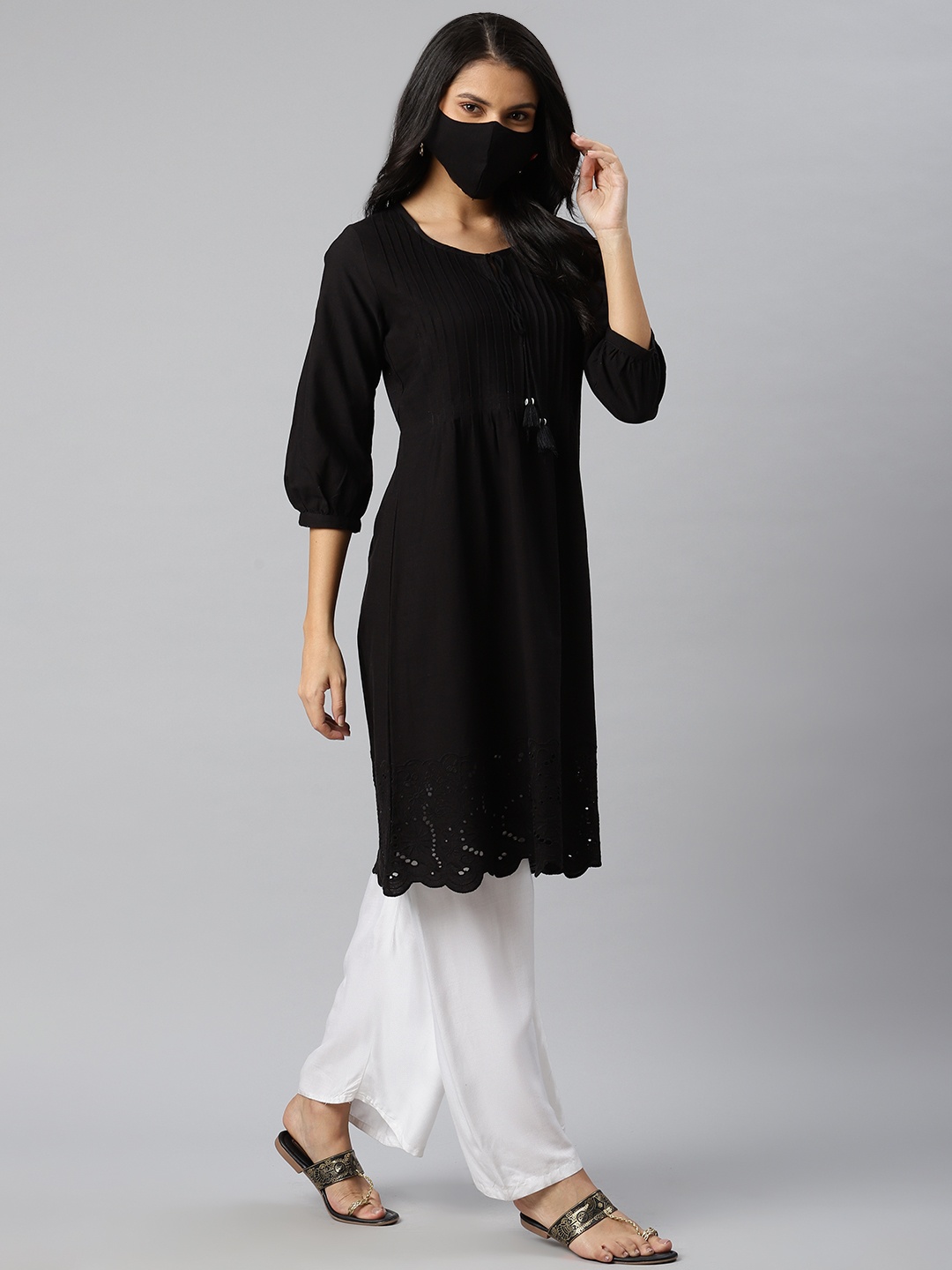 

Biba Women Black Solid A-Line Kurta With Schiffli Detailing