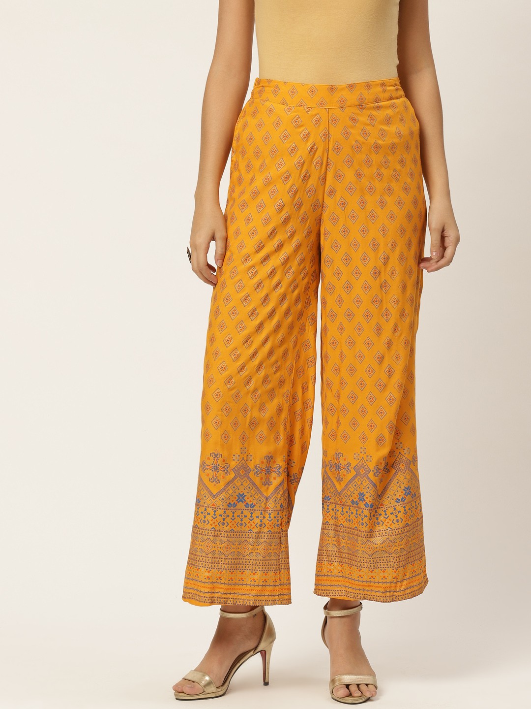 

Anouk Women Mustard Yellow & Navy Blue Ethnic Motifs Printed Flared Palazzos