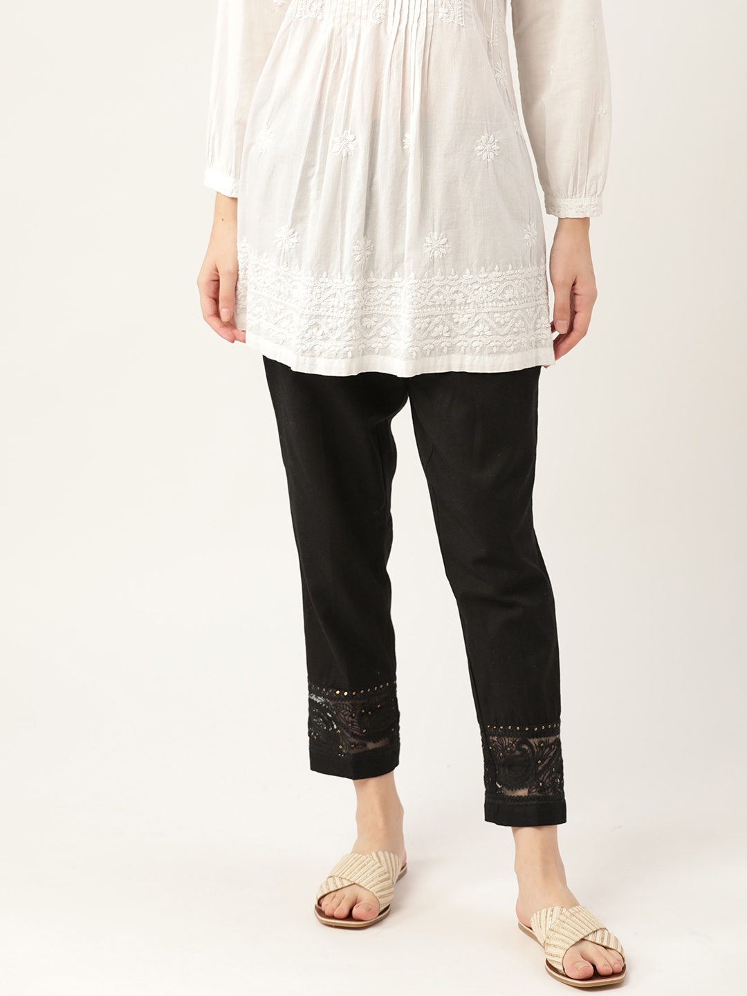 

Anouk Women Black Cropped Pure Cotton Cigarette Trousers with Lace Detail
