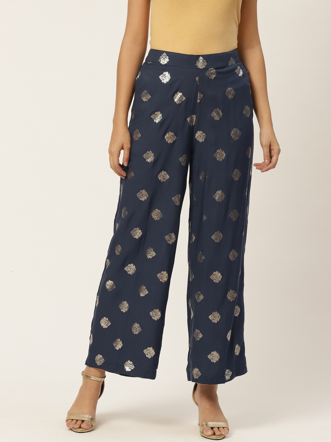 

Anouk Women Navy Blue & Golden Ethnic Motifs Printed Flared Palazzos