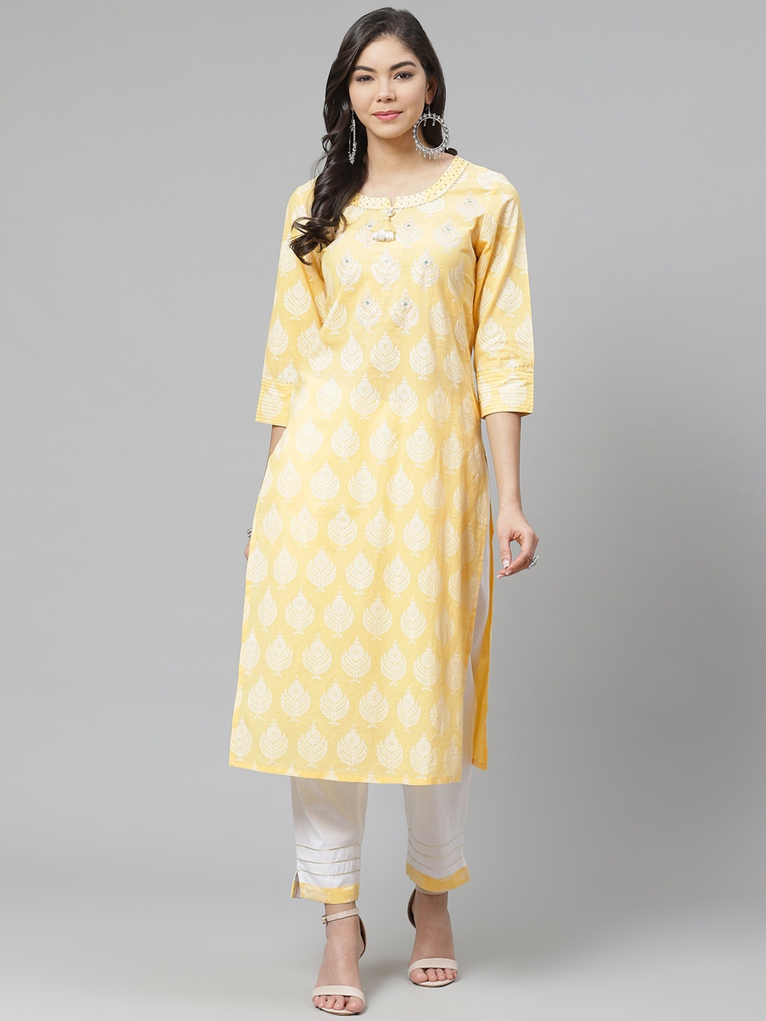 

PIROH Women Yellow & White Printed Kurta with Trousers