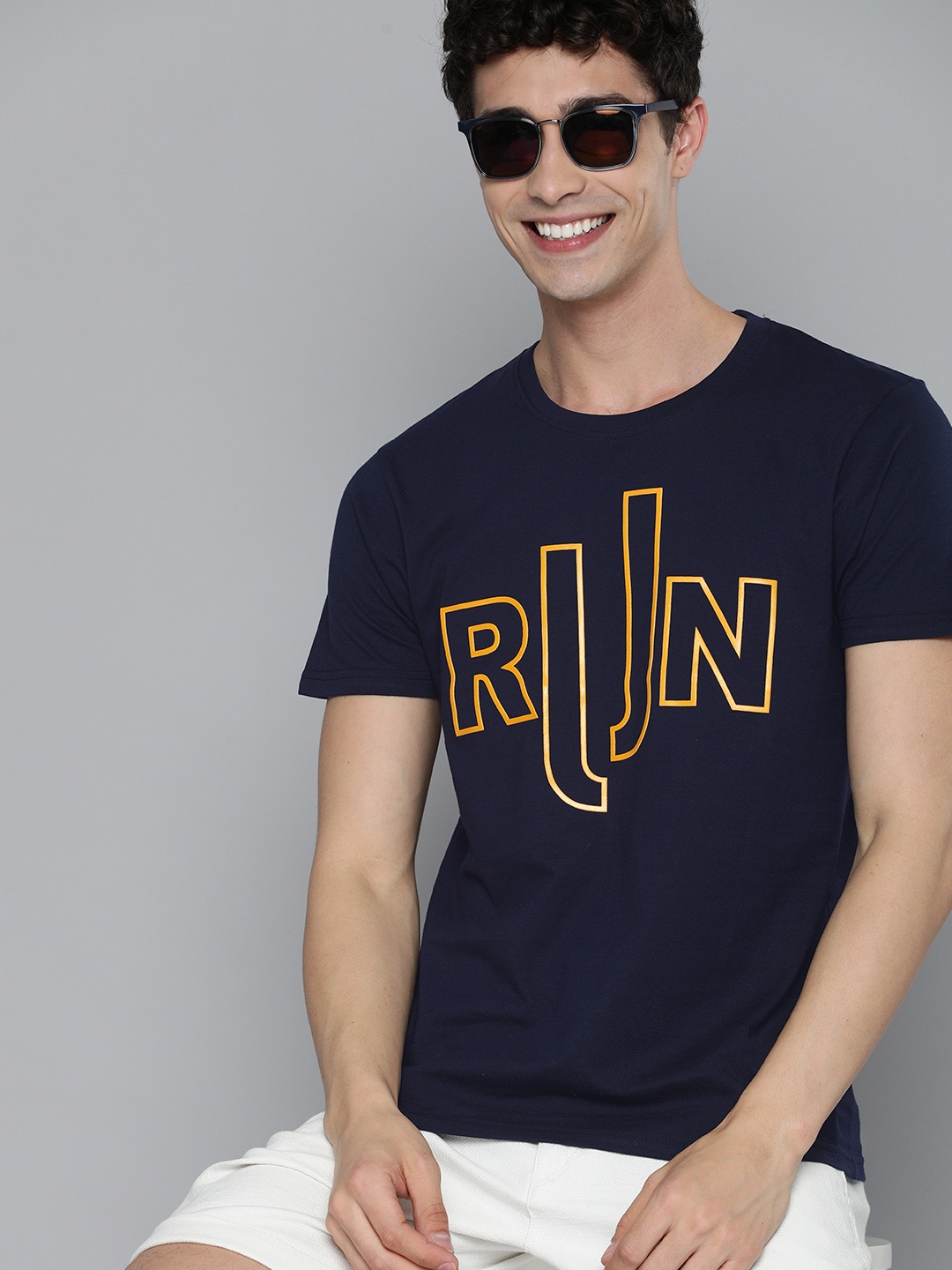 

HERENOW Men Navy Blue Orange Printed Pure Cotton T-shirt