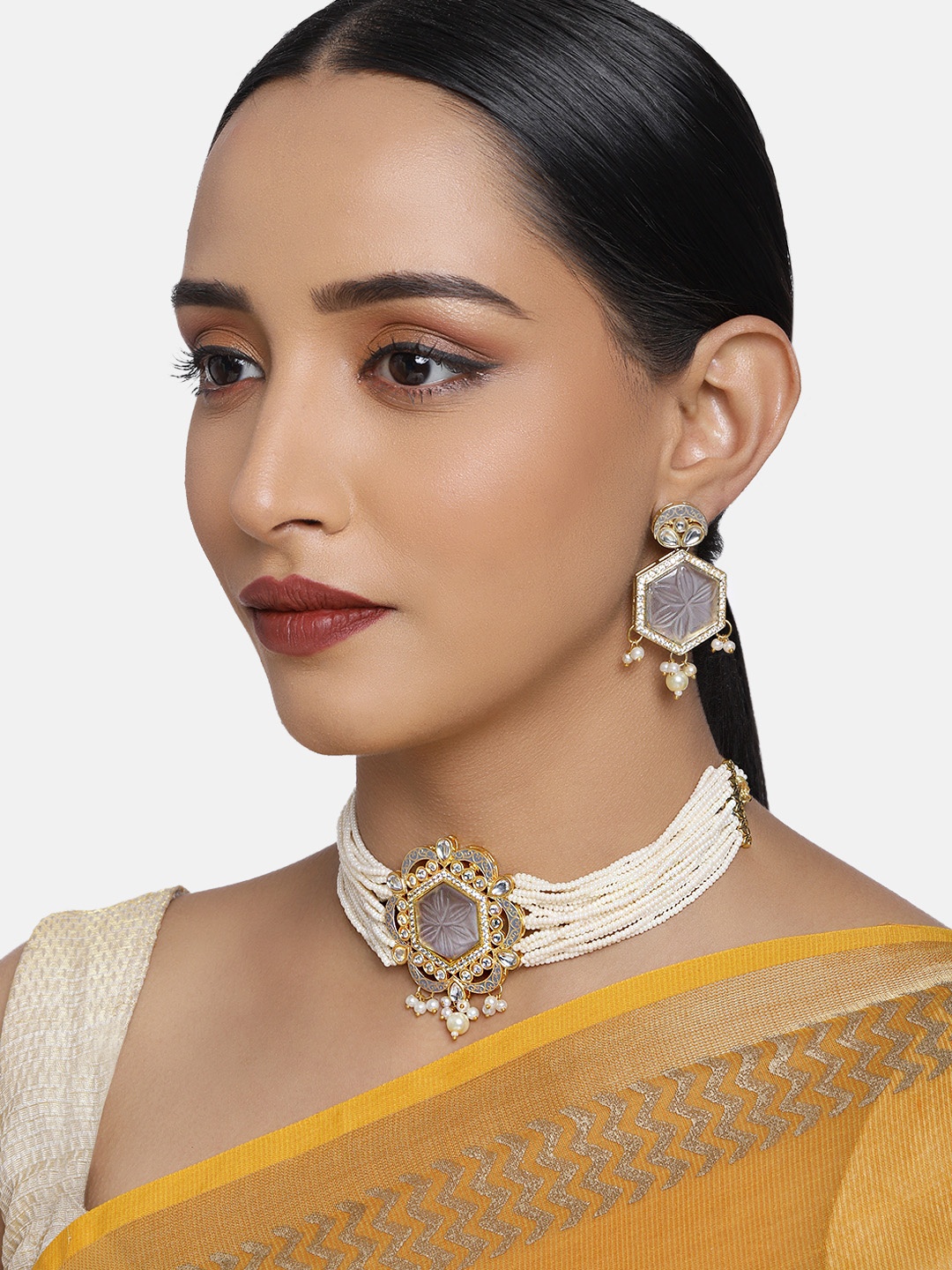 

justpeachy Women Grey Kundan Studded Jewellery Set