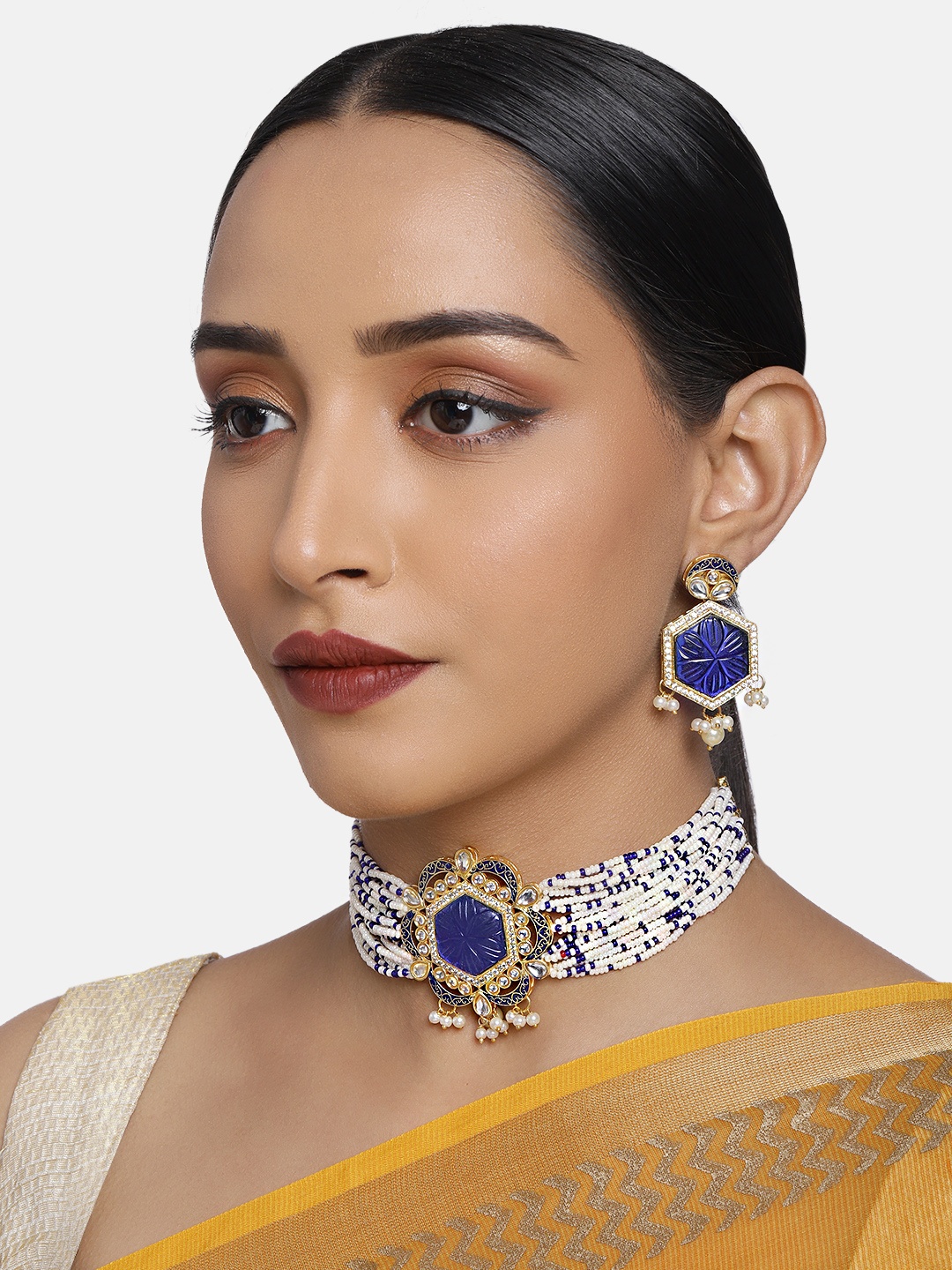 

justpeachy Women Blue Kundan Studded Jewellery Set