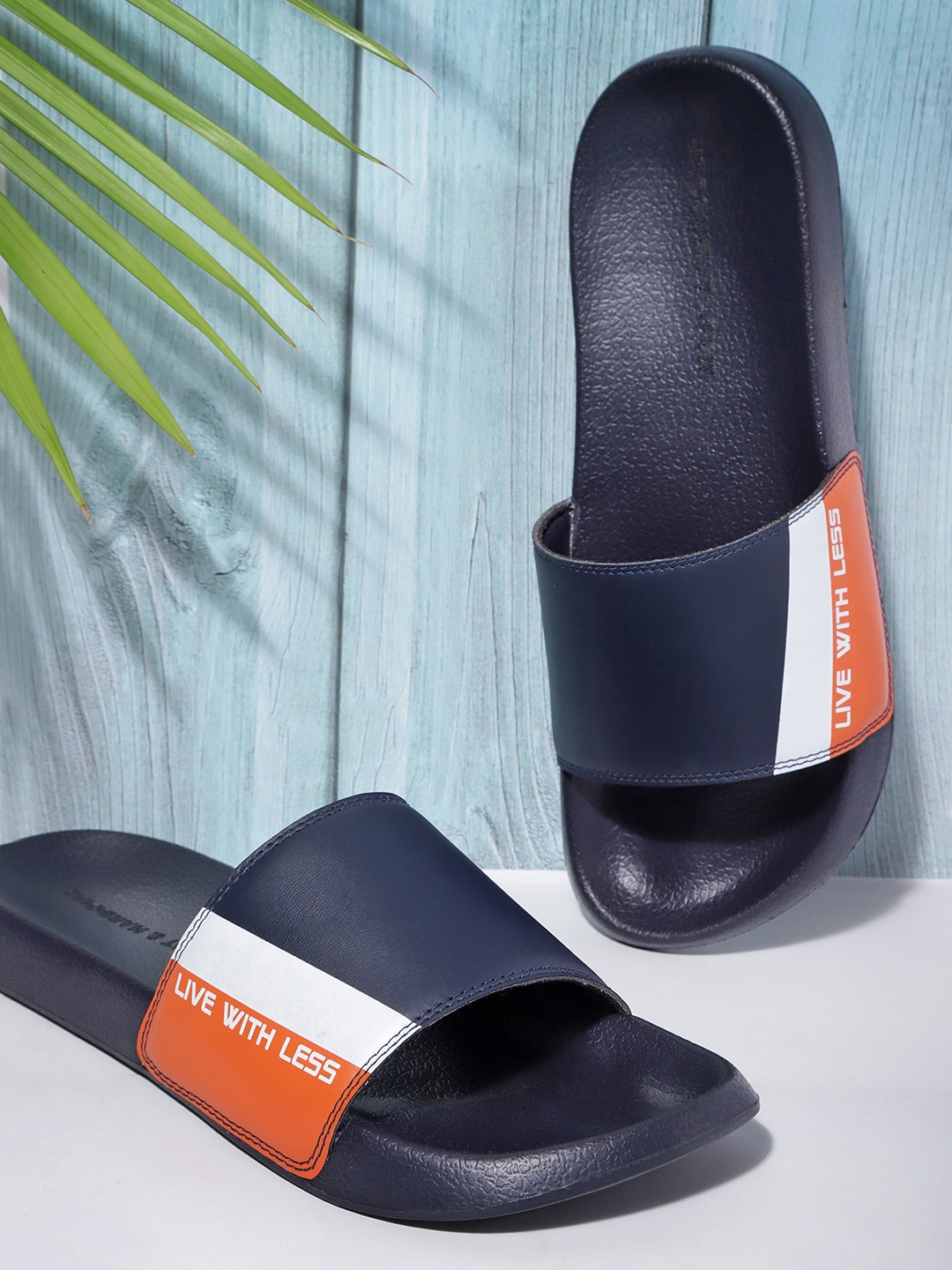 

Mast & Harbour Men Navy Blue & White Striped Detail Sliders