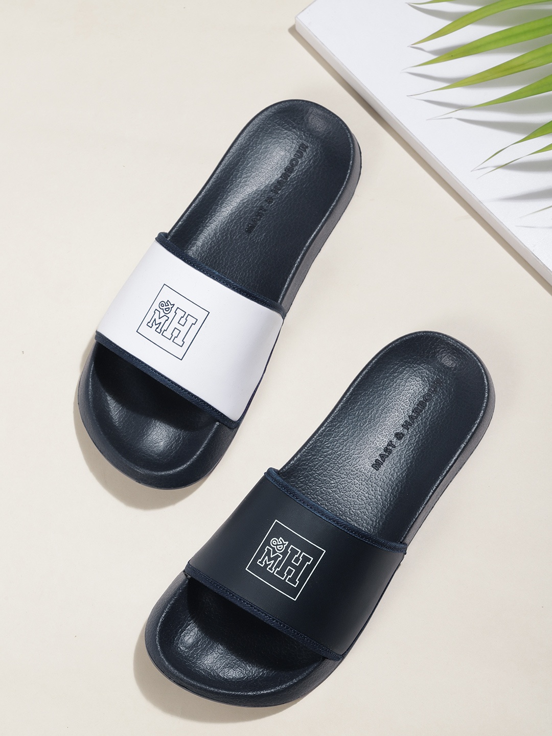 

Mast & Harbour Men Navy Blue & White Printed Sliders