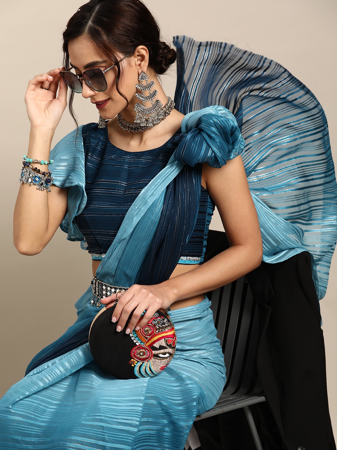

Tikhi Imli Calm Blue and Silver Sleek Saree