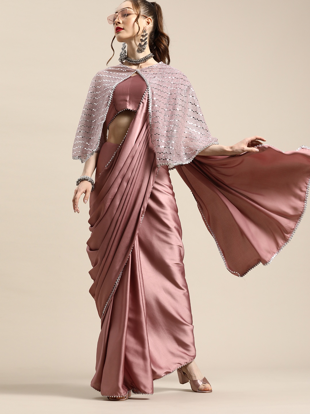 

Tikhi Imli Trendy Mauve Sleek Poly Crepe Saree with Embellished Border & Cape