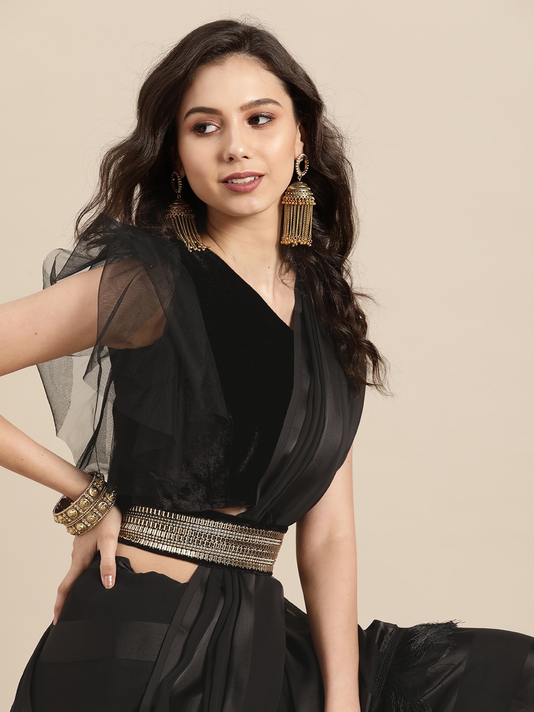 

Tikhi Imli Classic Black Self Striped Sleek Polyester Saree