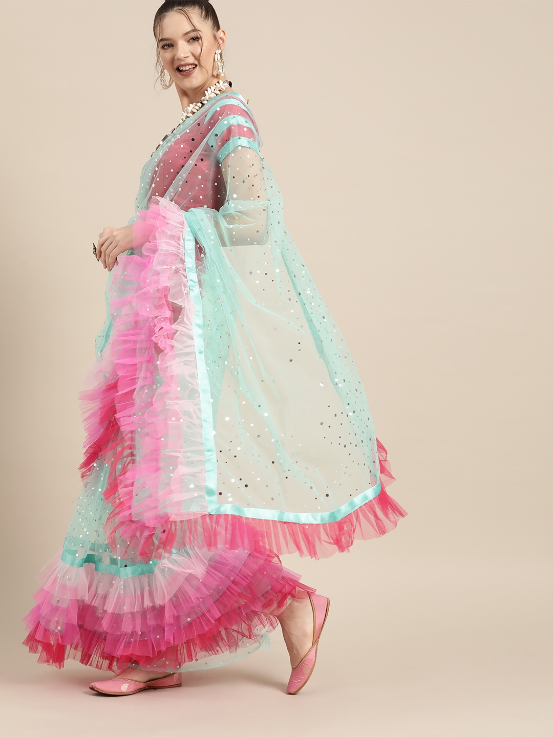

Tikhi Imli Pretty Blue and Pink Embellished Net Saree with Solid Border