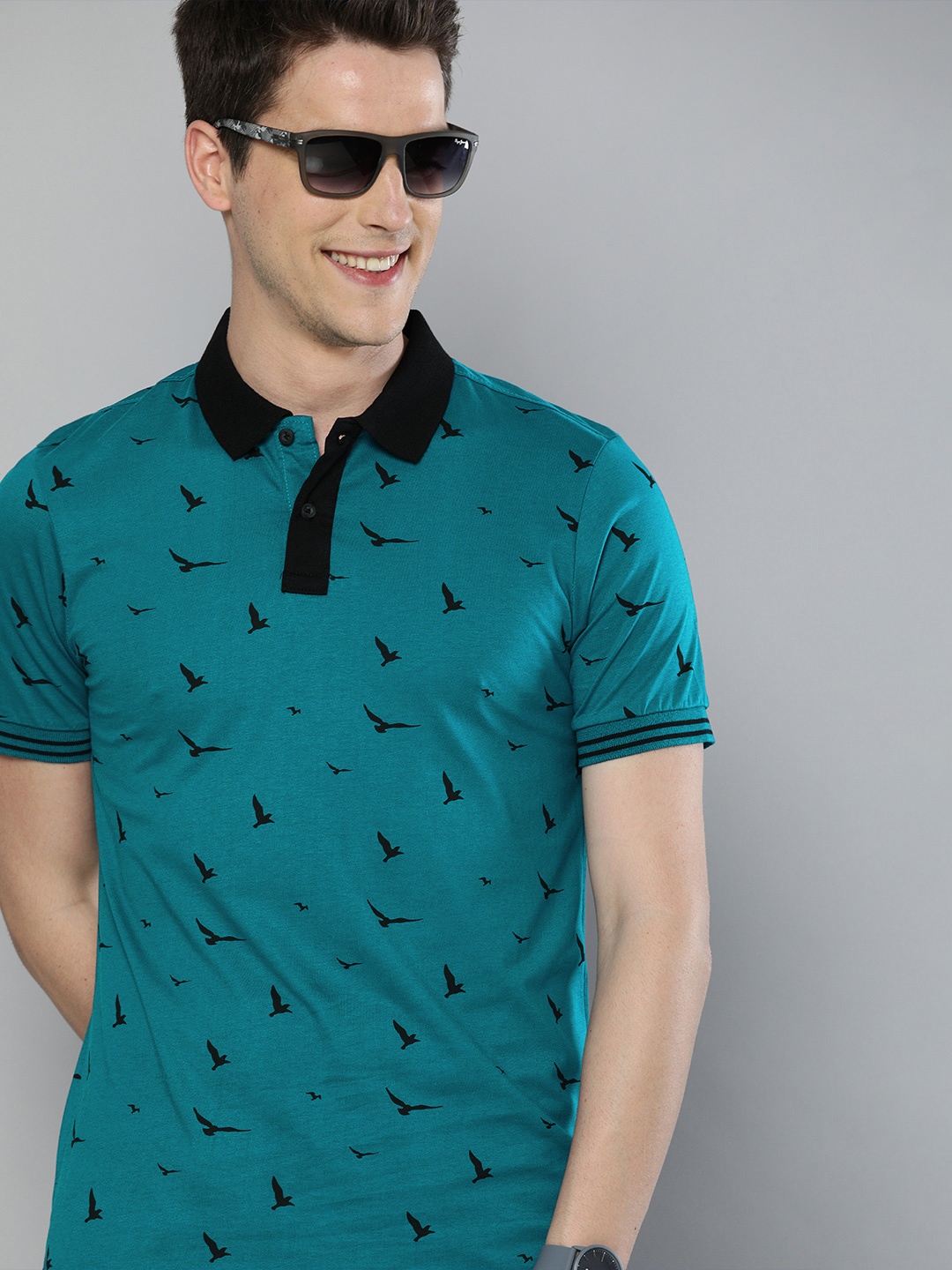 

HERENOW Men Teal Blue Printed Polo Collar Pure Cotton T-shirt