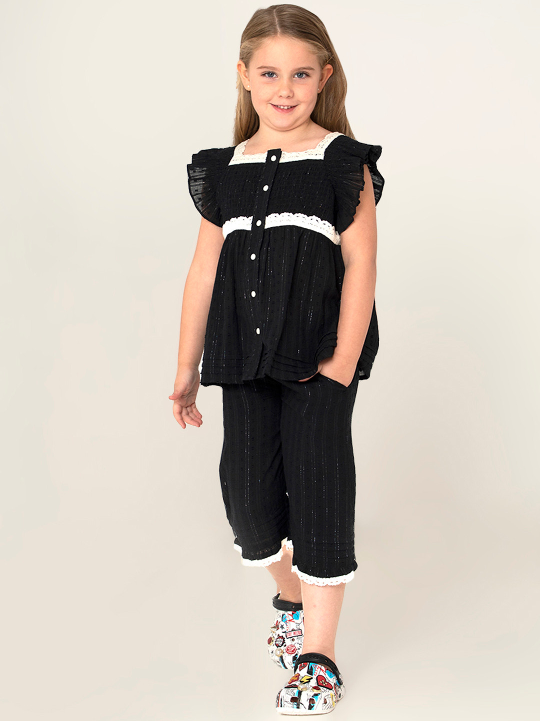 

Cherry Crumble Girls Black Self Striped Dobby Night suit with Smocked Detail