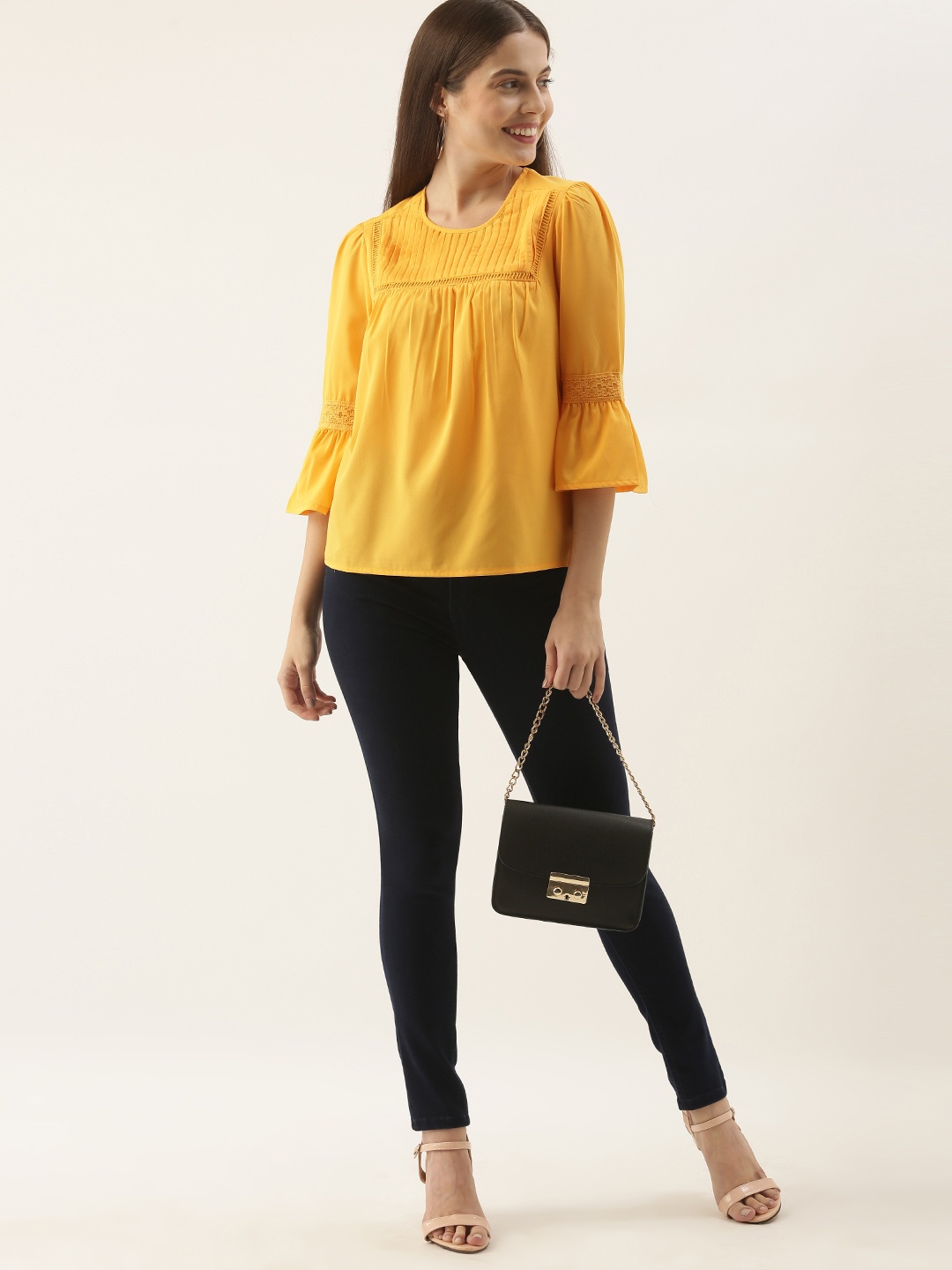 

DressBerry Women Yellow Solid Gathered and Pleated Bell Sleeve Blouson Top