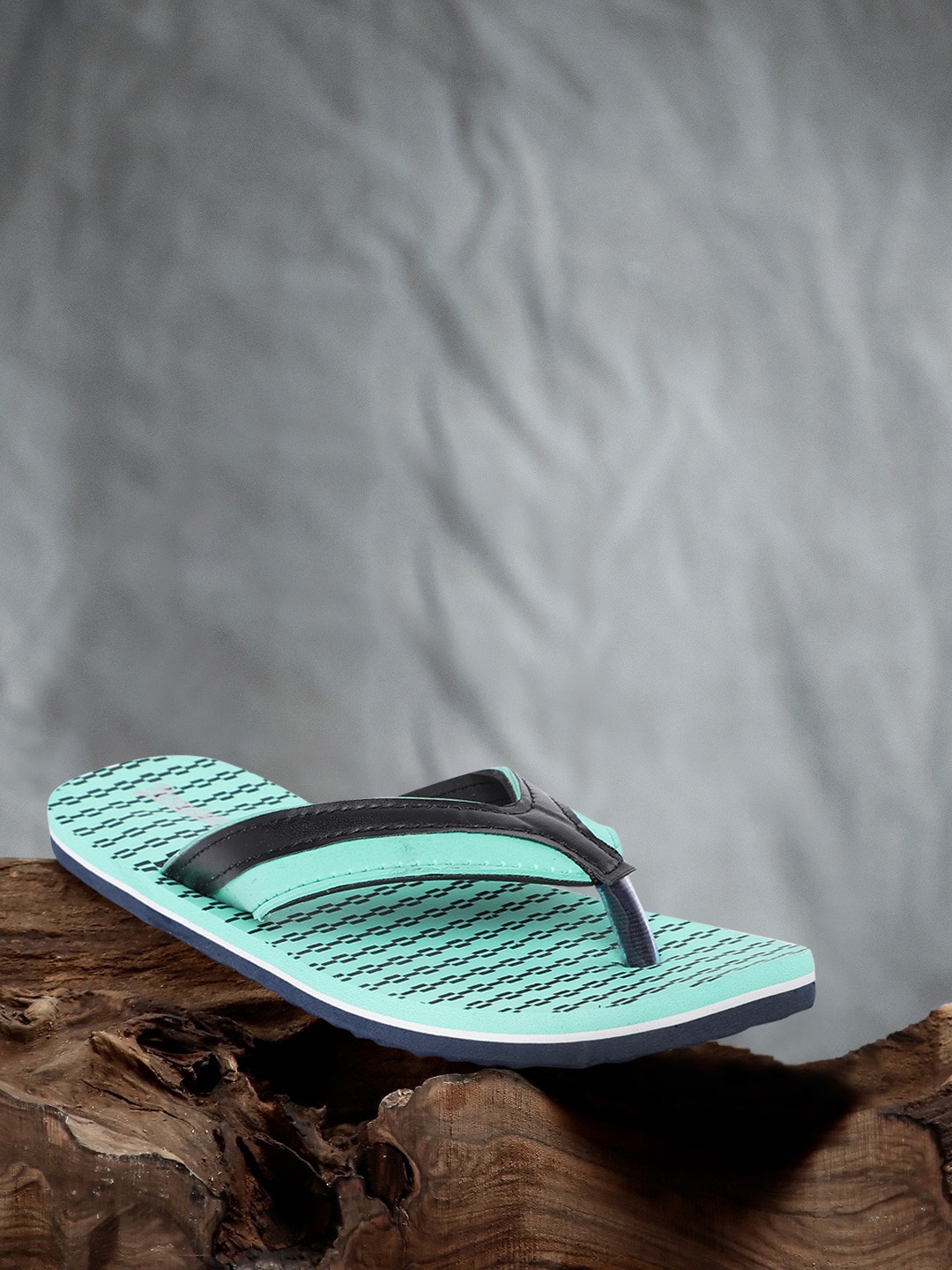 

Roadster Women Sea Green & Black Printed Thong Flip-Flops