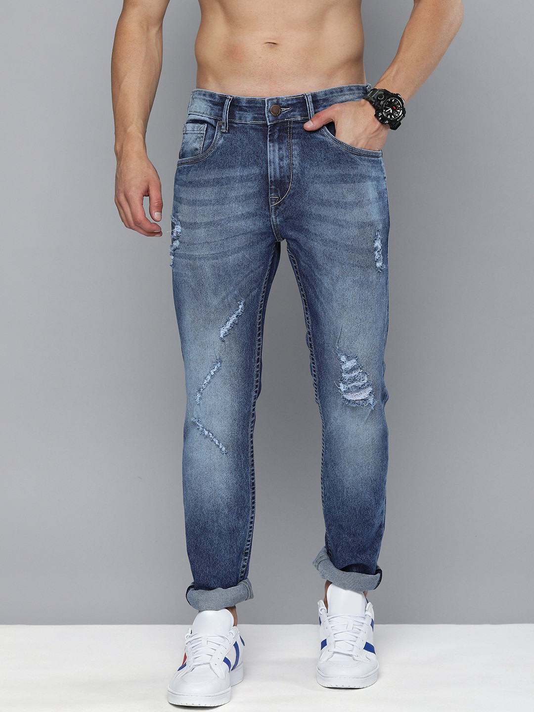 

HERE&NOW Men Blue Slim Fit Heavy Fade Cat Scratched Mid Rise Stretchable Jeans