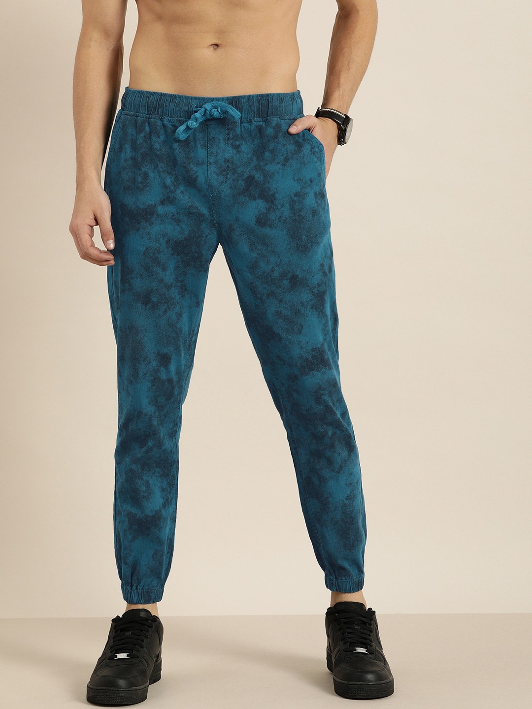 

Moda Rapido Men Blue Self Design Textured Joggers