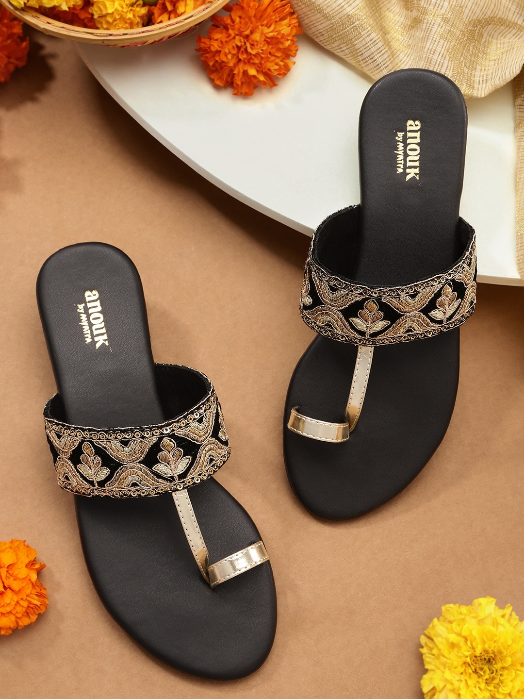 

Anouk Women Gold-Toned & Black Embroidered Ethnic One Toe Flats