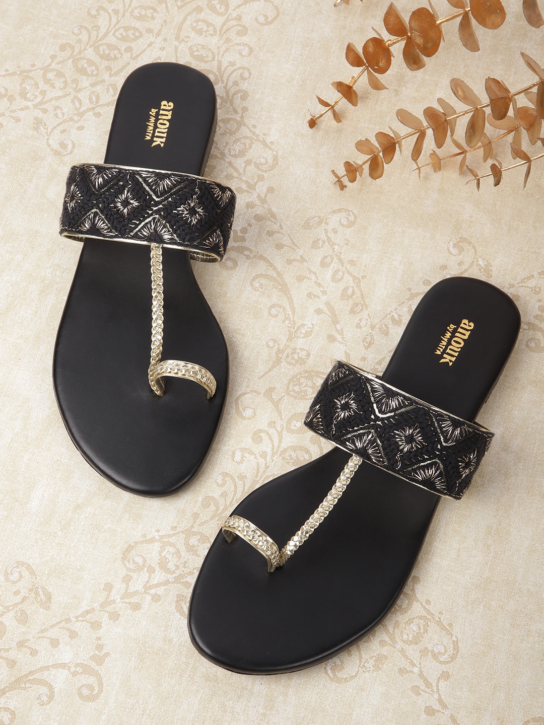 

Anouk Women Black & Gold-Toned Floral Embroidered One Toe Flats