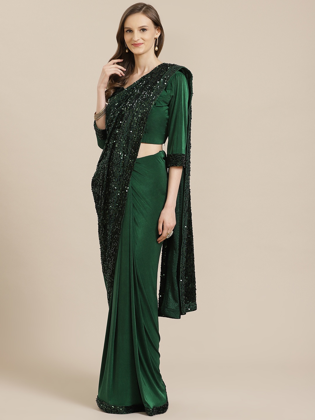 

Mitera Green Sequinned Half & Half Saree