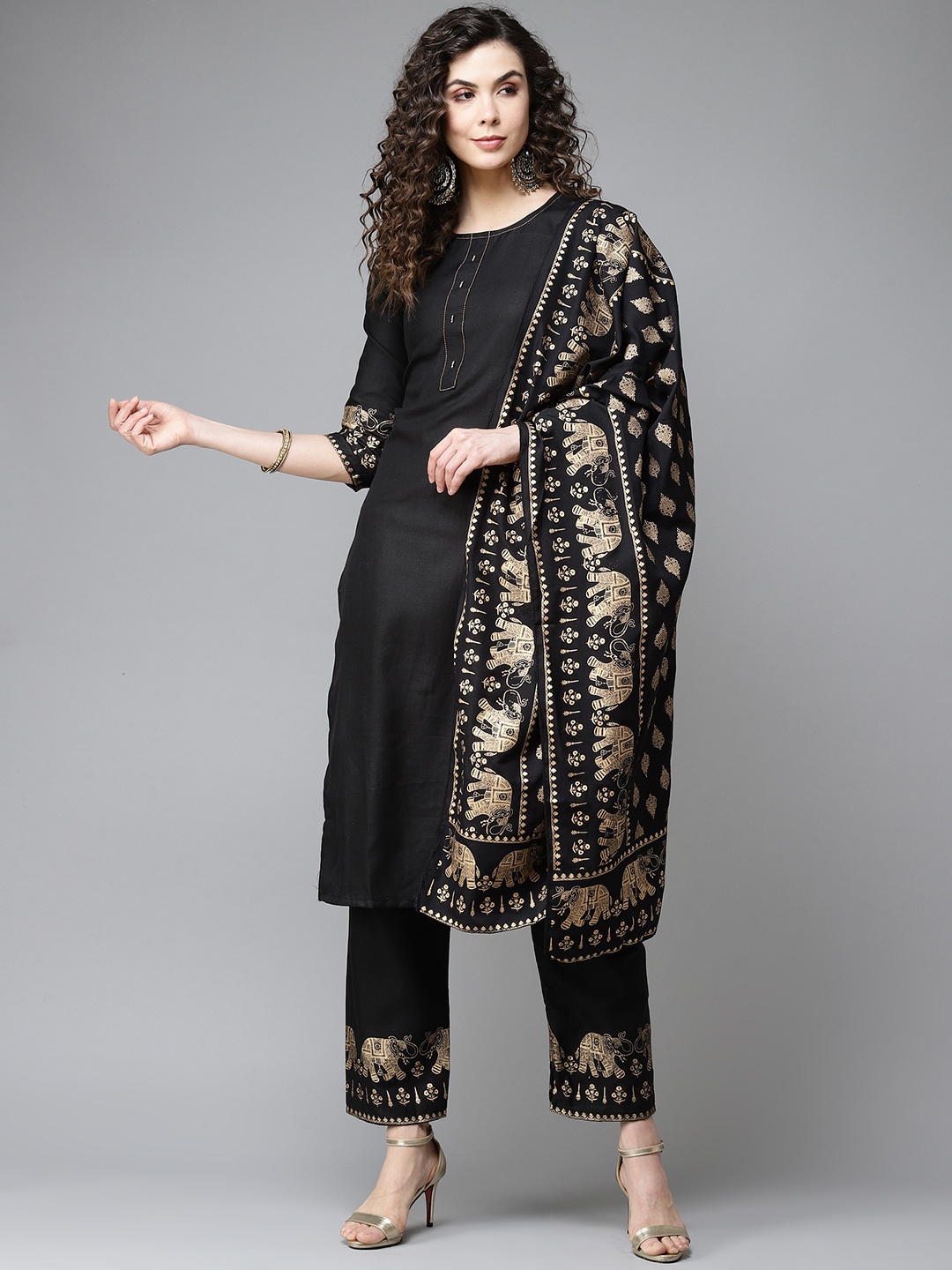 

GoSriKi Women Black & Golden Solid Kurta with Trousers & Dupatta