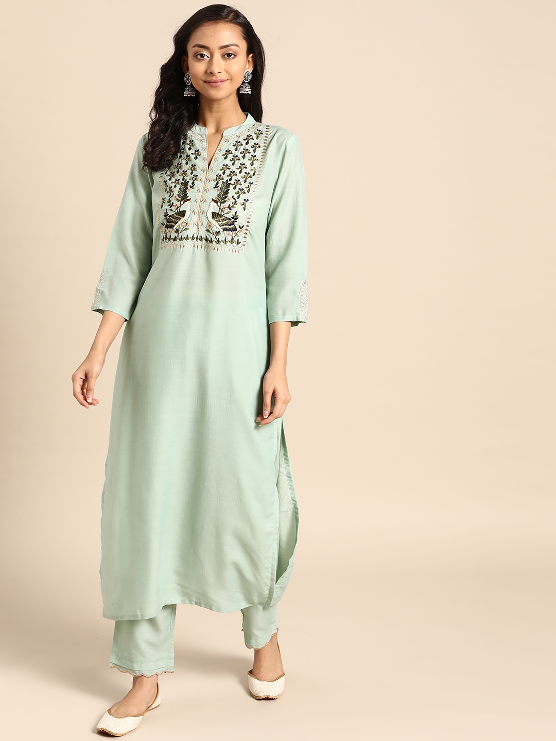 

Varanga Women Sea Green Yoke Design Kurta with Trousers