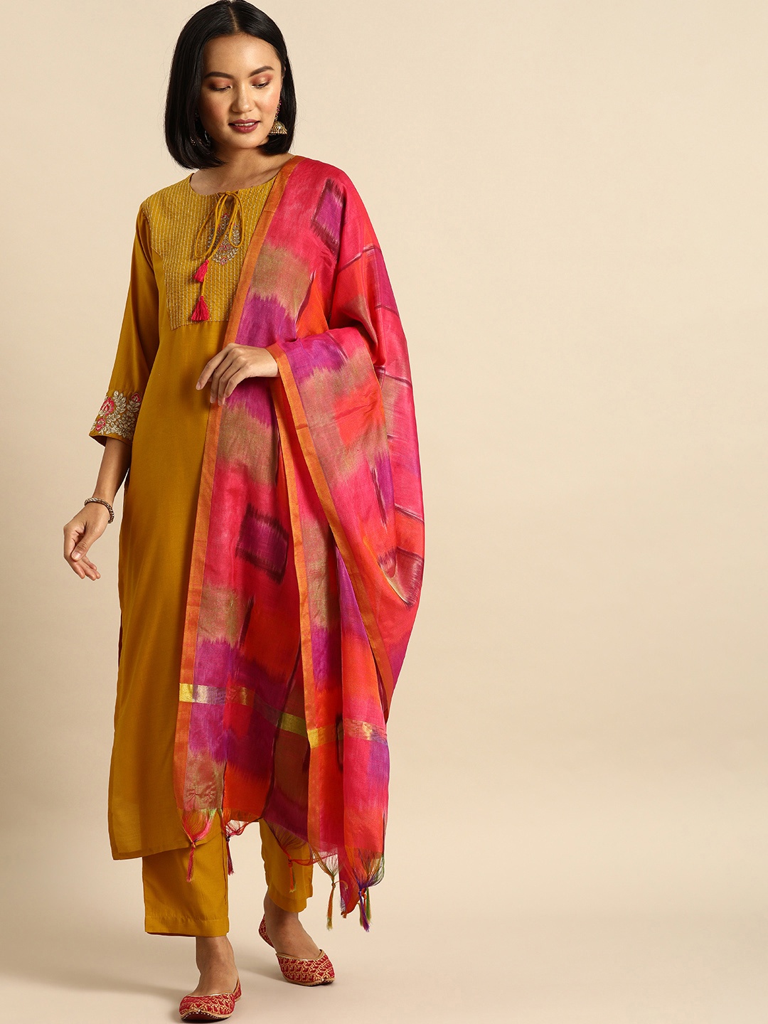 

Varanga Women Mustard Yellow Embroidered Kurta with Trousers & Dupatta