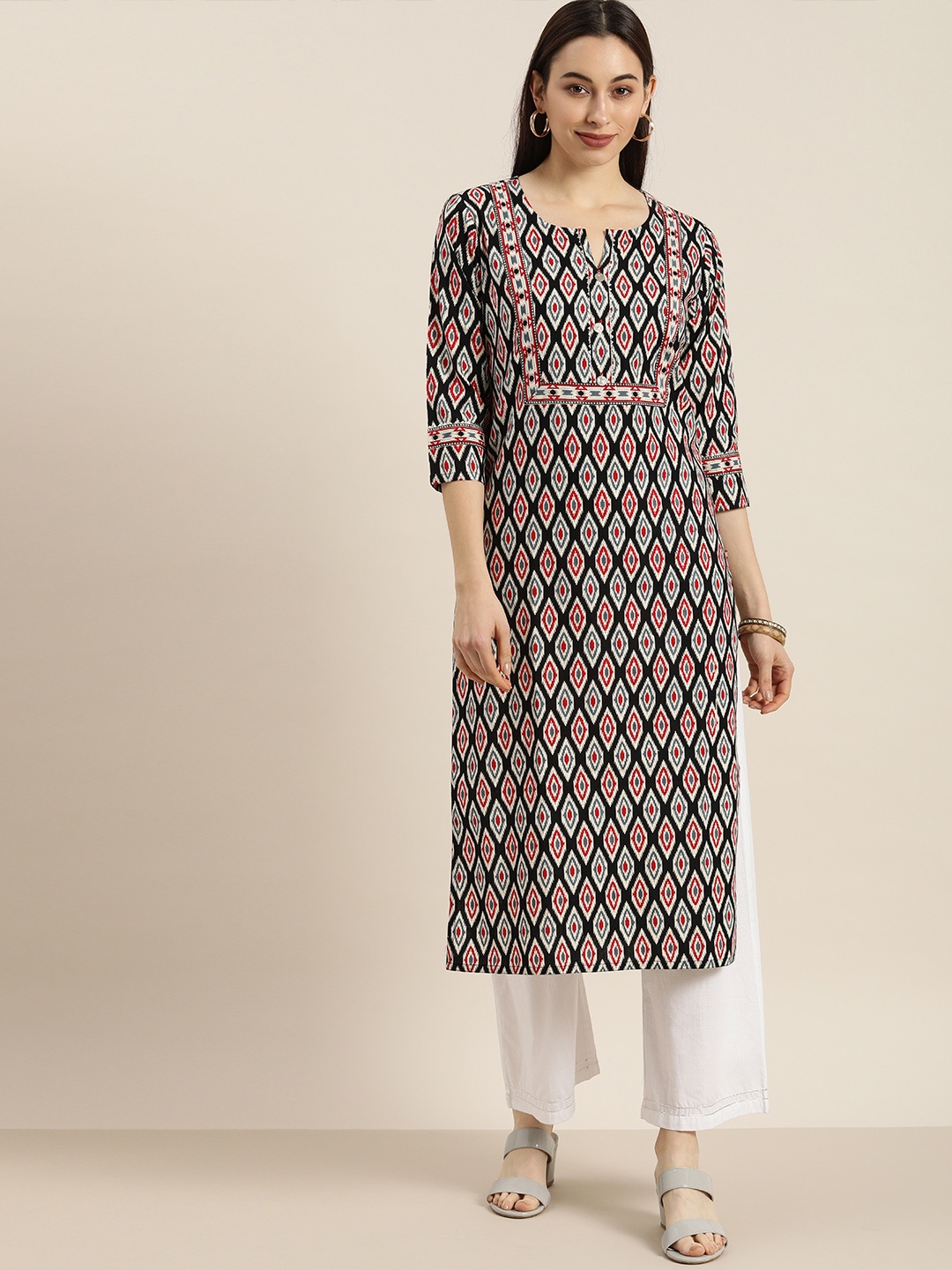 

KSUT Women Black & Red Ikat Printed Kurta with Palazzos