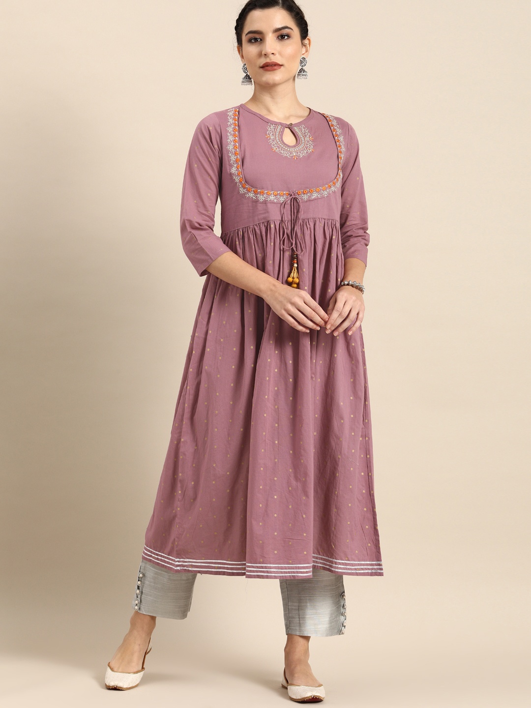 

Varanga Women Mauve & Golden Printed Keyhole Neck Thread Work Kurta