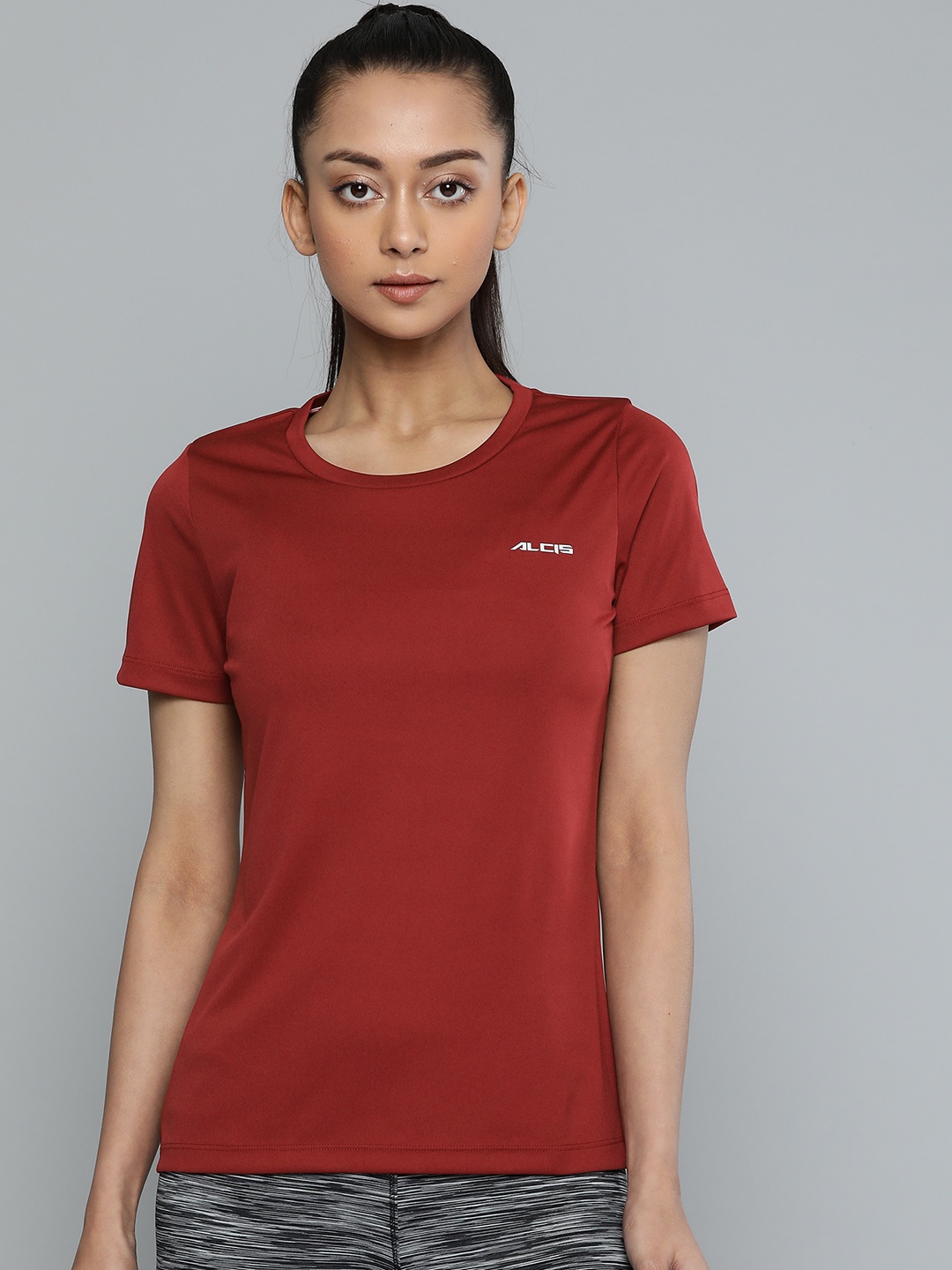 

Alcis Women Rust Red Slim Fit Solid Round Neck T-shirt