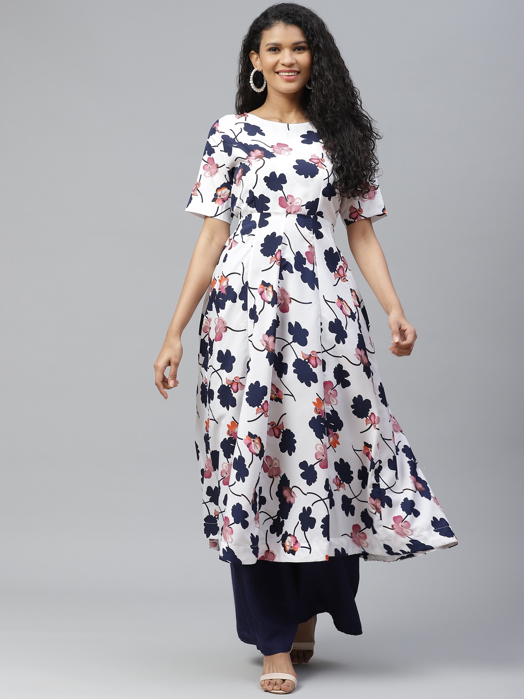 

Poshak Hub Women White & Navy Blue Floral Printed Floral Crepe Kurta