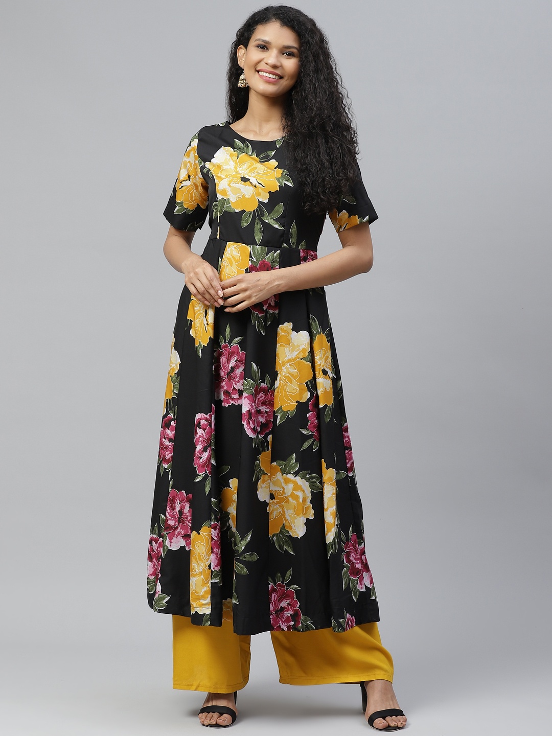 

Poshak Hub Women Black & Yellow Floral Printed Floral Crepe Kurta