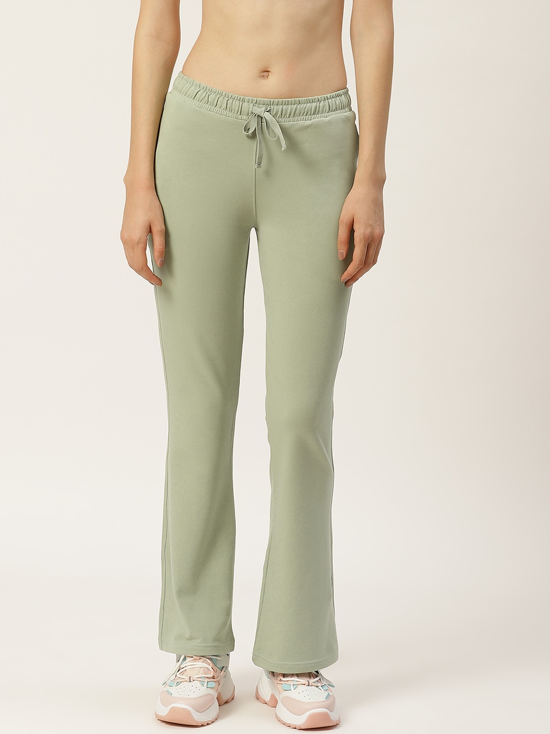 

FEMEA Women Green Solid Bootcut Fit Track Pants