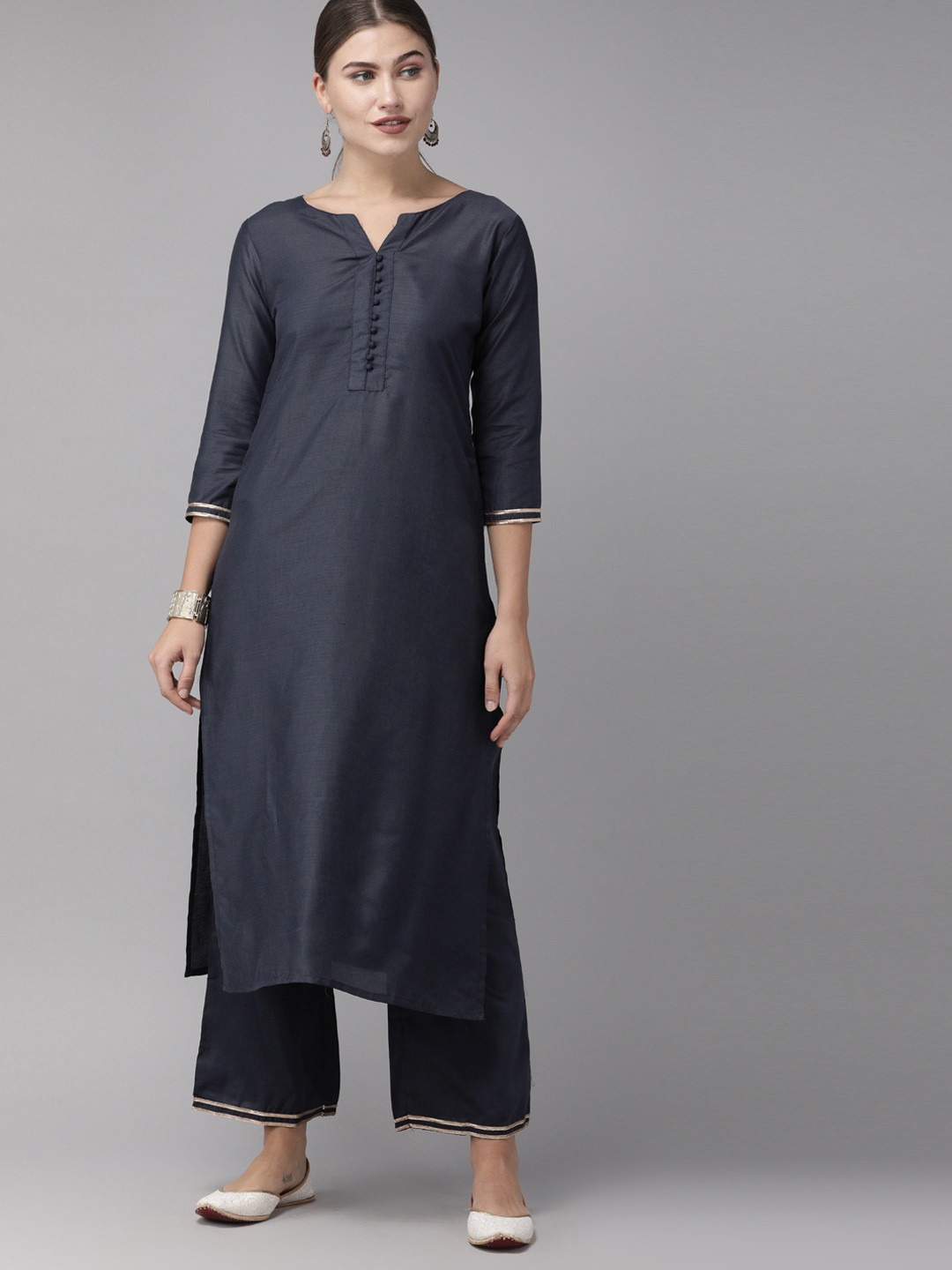 

Indo Era Women Navy Blue Solid Kurta with Palazzos