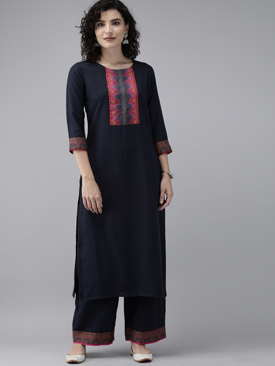 

Indo Era Women Navy Blue Solid Kurta with Palazzos